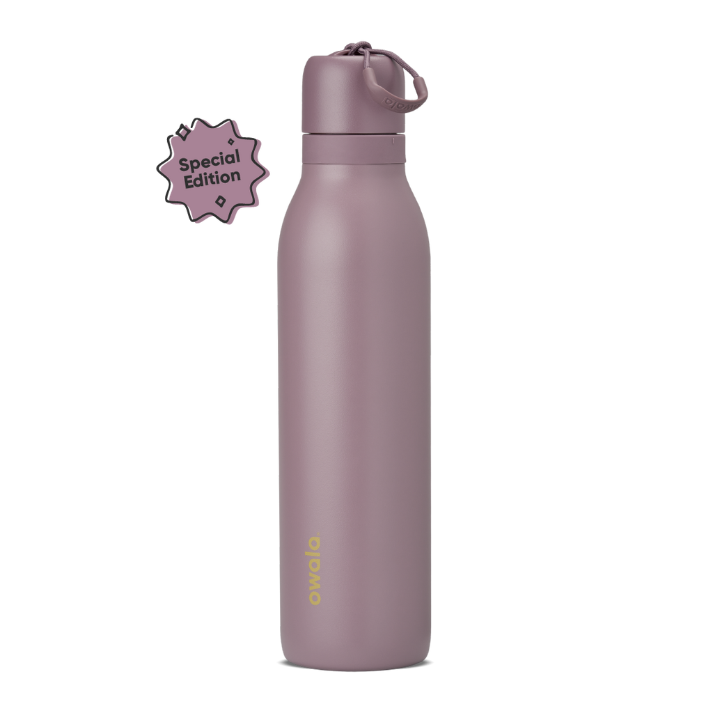 FreeSip Twist 24oz, coral pink body with orange-red lid and purple band; slim insulated bottle